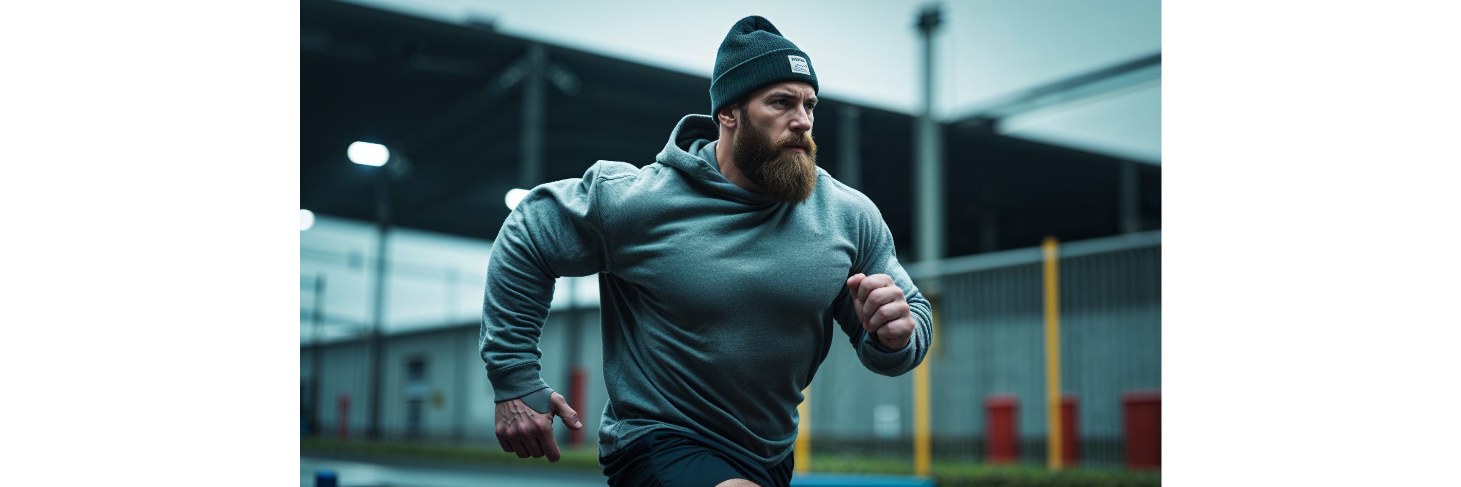 bartiger-mann-joggen-industriegebiet-hero-wod-bert